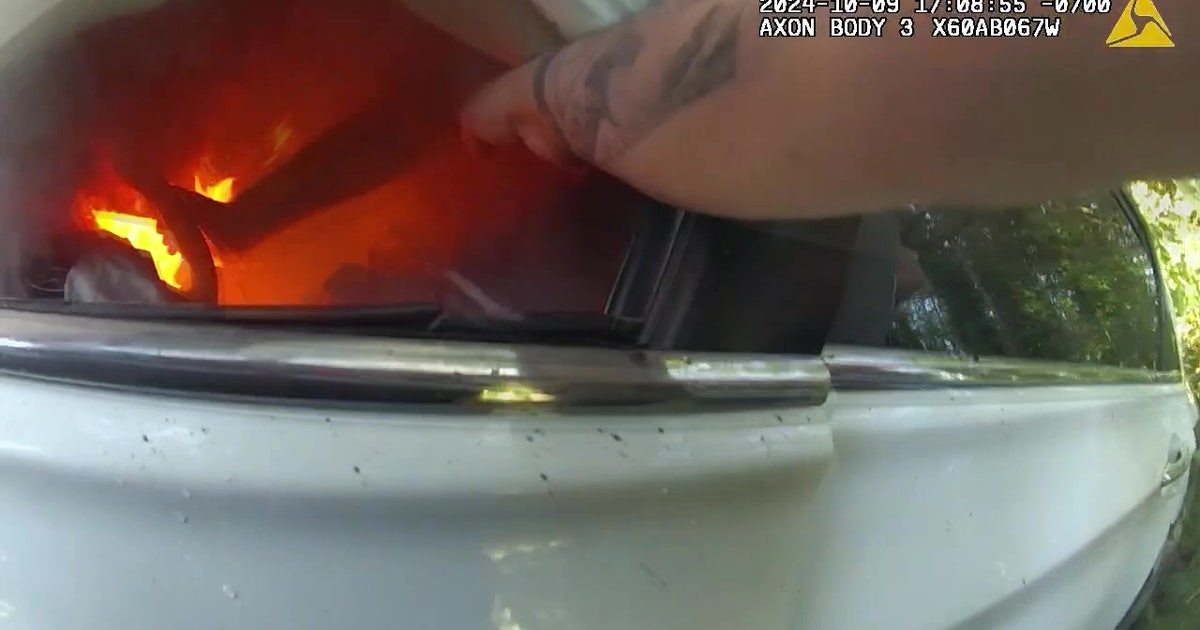 VIDEO: King County deputies pull man out of burning car | FOX 13