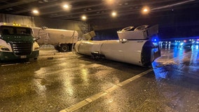 Milk spill from overturned semi-truck blocks Seattle traffic
