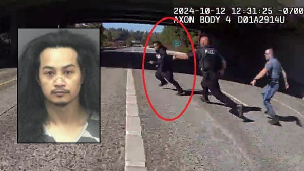 Rare bodycam shows suspect throw bomb at WA police officers on I-90