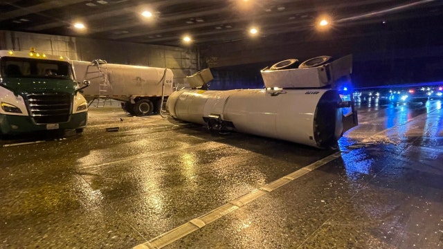 Milk spill from overturned semi-truck blocks Seattle traffic