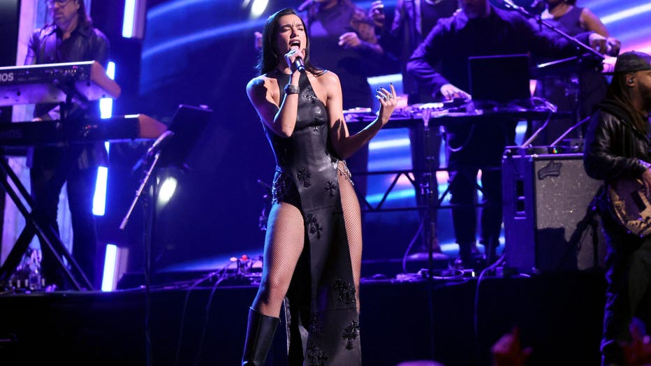 Dua Lipa performs on stage