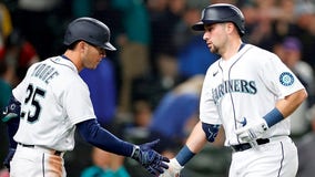 Seattle Mariners catcher Cal Raleigh, utility man Dylan Moore win Gold Gloves