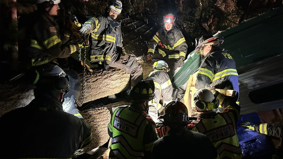 Two people are recovering in the hospital after a tree toppled onto their trailer in Maple Valley due to powerful winds from a bomb cyclone in Washington.
Puget Sound Fire (PSF) reported the rescue effort at 9:11 p.m. on Tuesday. They stated two individuals were trapped inside the trailer located near the corner of SE 184th St. and 246th Ave. SE. Rescue crews successfully freed one victim quickly. However, it took about an hour to pull the second patient from the wreckage. The PSF said that one patient was taken to a nearby hospital by ambulance, while King County Medic One took the other. The current conditions of the victims are unknown. 