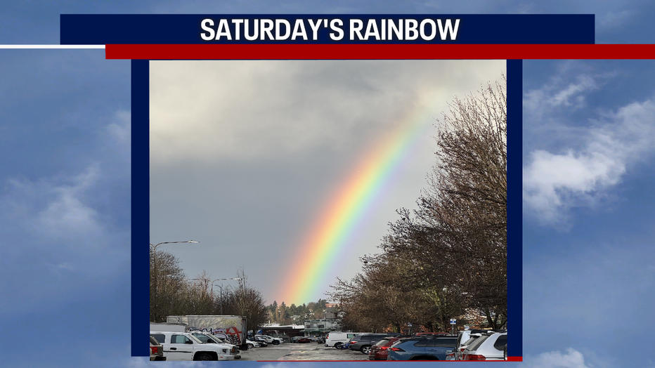 A beautiful double rainbow appeared over the city today. 