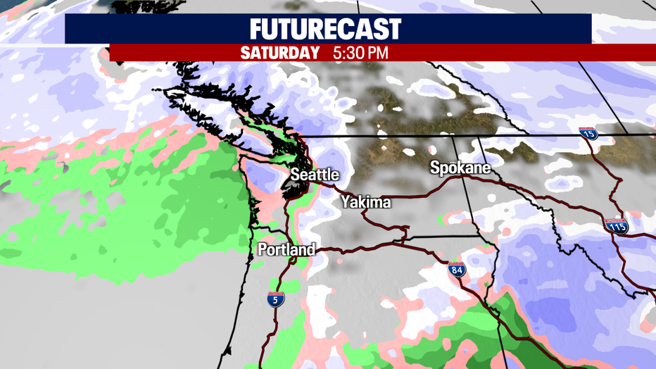 A card showing greater rain and snow chances for Western Washington.