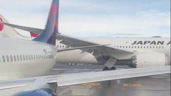 Japan Airlines plane clips tail of Delta plane at Sea-Tac Airport