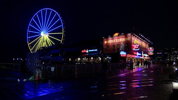 Seattle landmarks light up in Ukraine flag colors to honor war-torn country