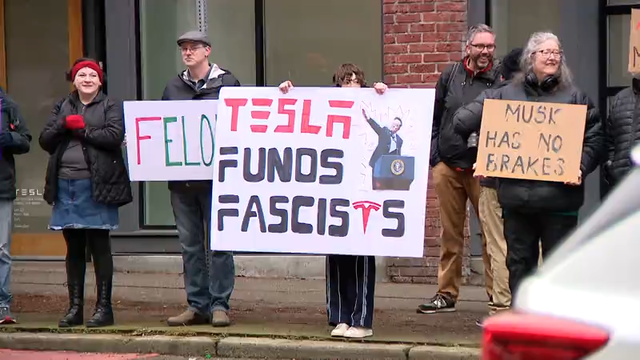 Rising anti-Tesla sentiment in Seattle leads to protests, vandalism, possible arson