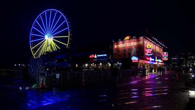 Seattle landmarks light up in Ukraine flag colors to honor war-torn country