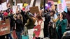 Crowds block traffic in Seattle during International Women's Day march
