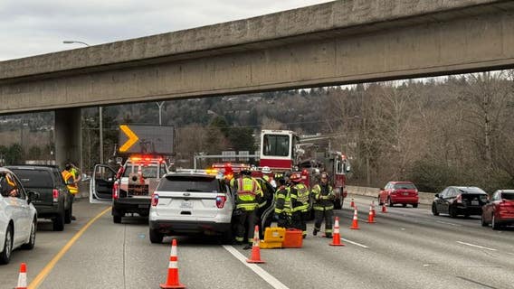 Car goes off SR 599 overpass after deadly crash, lands on I-5 in Tukwila