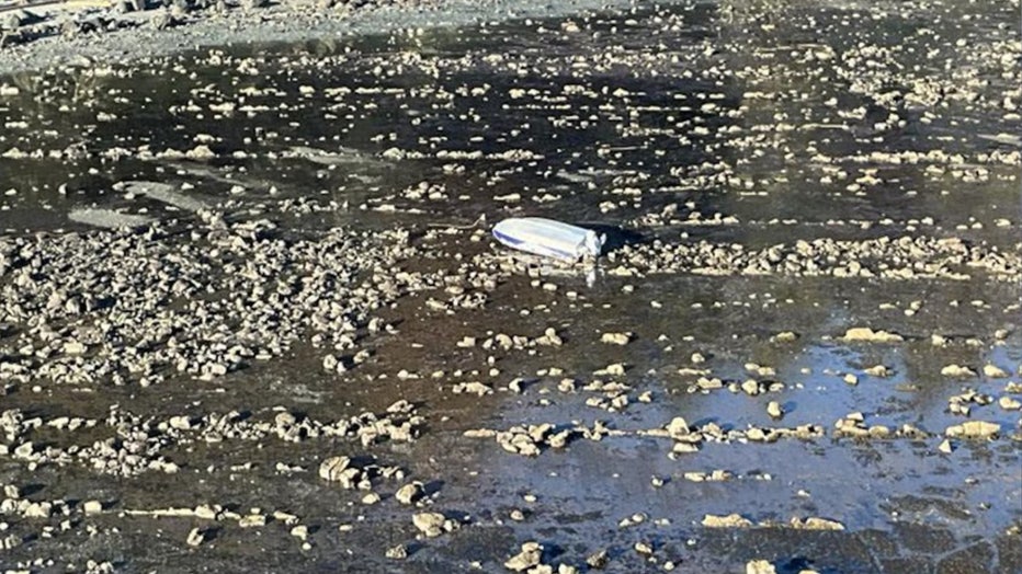 The U.S. Coast Guard suspended the search for two overdue boaters after discovering the group's capsized boat off Neah Bay. One of the boaters was recovered dead Thursday afternoon; the other two remain missing. All three were residents of Snohomish County, Washington.
