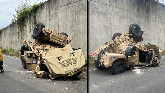 Military vehicle crashes over I-90 wall in Bellevue, WA