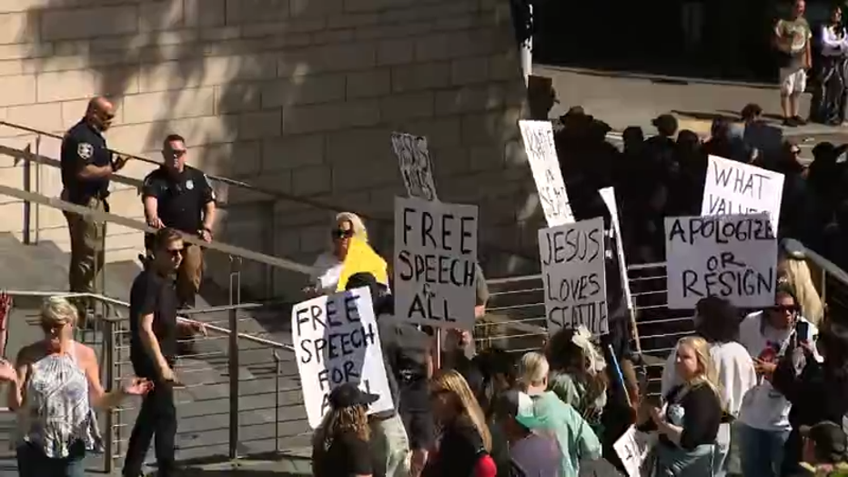 protesters outside city hall