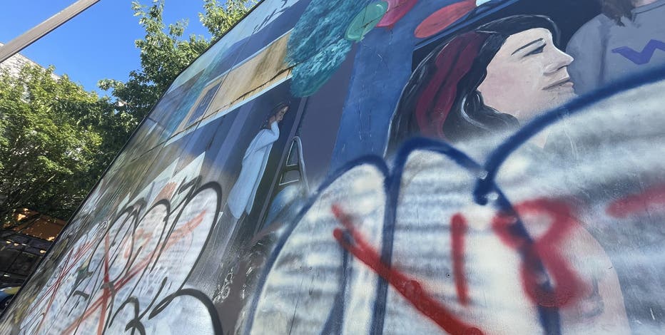 Video shows taggers covering beloved Seattle U-District mural in graffiti