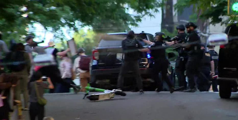 Anti-ICE protesters clash with police at Seattle Federal Building