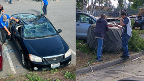 Monster truck tire flies off, crushes car in Kitsap County, WA parking lot