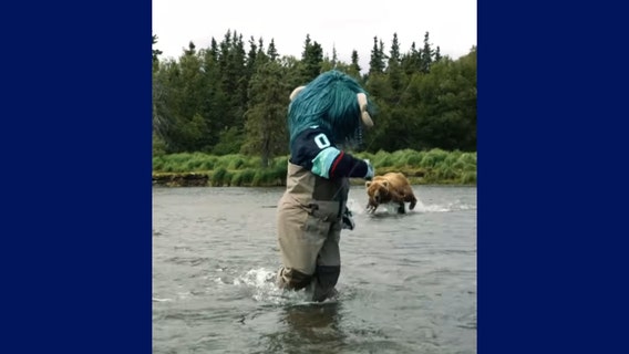 Bear charges Seattle Kraken mascot Buoy