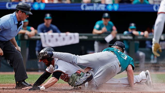 Late rally attempt falls short as Seattle Mariners lose 5-3 to Orioles after rain delay