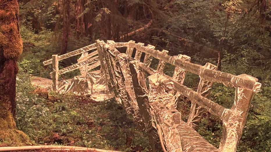 Popular hiking bridge in Staircase area wrapped in foil to prevent damage from Bear Gulch Fire