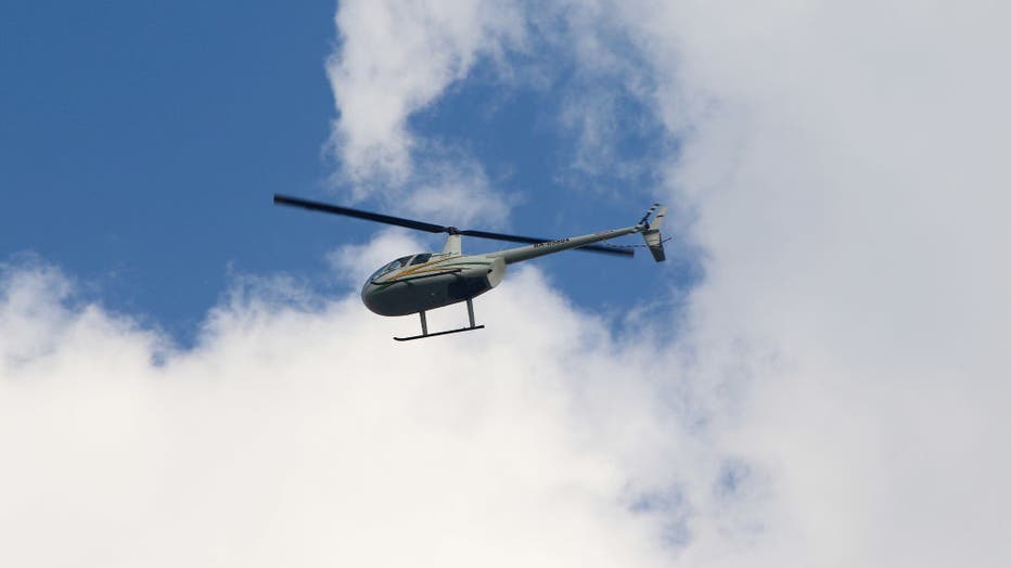 Photo of a R44 helicopter.