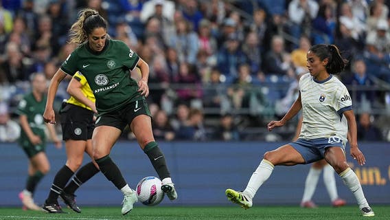 Seattle Reign match suspended after Racing Louisville midfielder Savannah DeMelo collapses