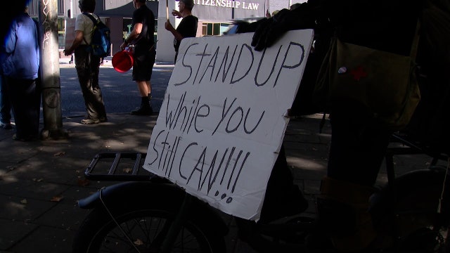 Protesters rally outside Seattle ABC affiliate after Jimmy Kimmel pulled off air