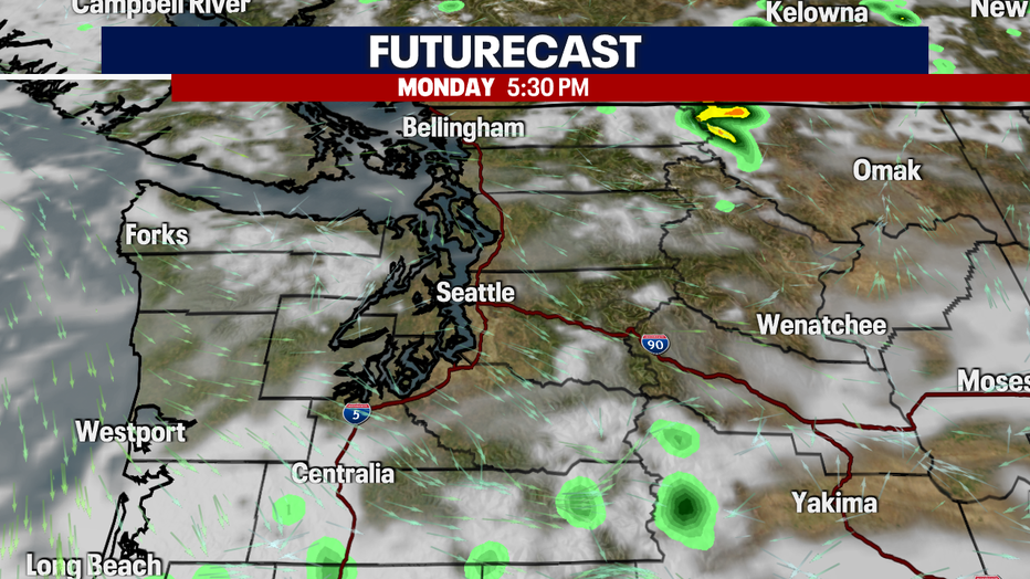 Mainly cloudy with a stray shower possible Monday. 