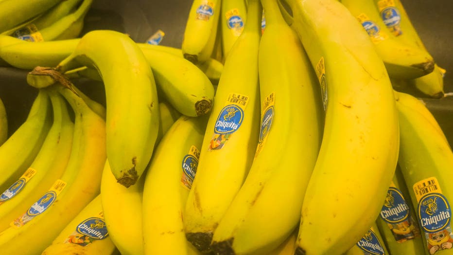 bananas on shelf in grocery store