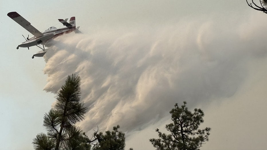 Scooper plane dropping water on Labor Mountain Fire Photo: Dwayne Eager, Line Medic