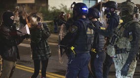 Portland braces for federal troops as protests escalate and a conservative influencer is arrested