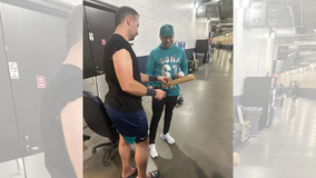 'Dump 61 Here' Seattle Mariners fan catches homer, meets Cal Raleigh