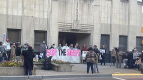 People gather outside Tacoma, WA City Hall to protest expansion of camping ban