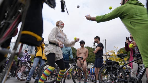 Naked bike riders demonstrate against federal troops in 'quintessentially Portland' protest