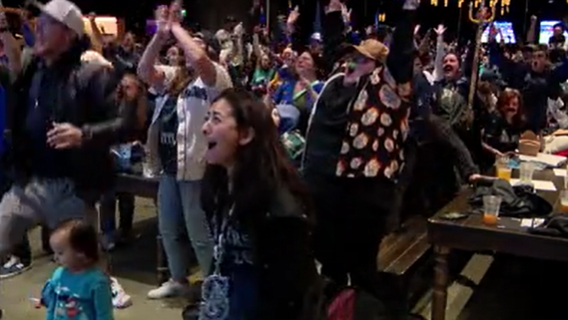 Seattle Mariners fans celebrate ALCS Game 1 victory