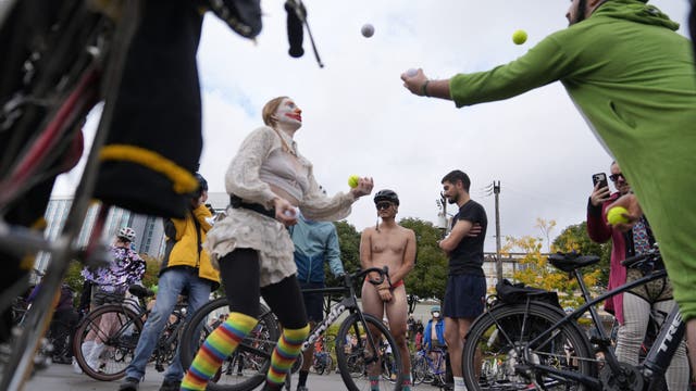 Naked bike riders demonstrate against federal troops in 'quintessentially Portland' protest