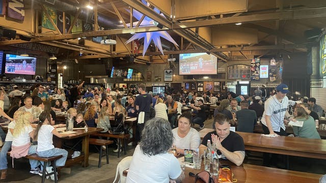 Seattle fans pull a 'double feature,' watching Seahawks, Mariners all day