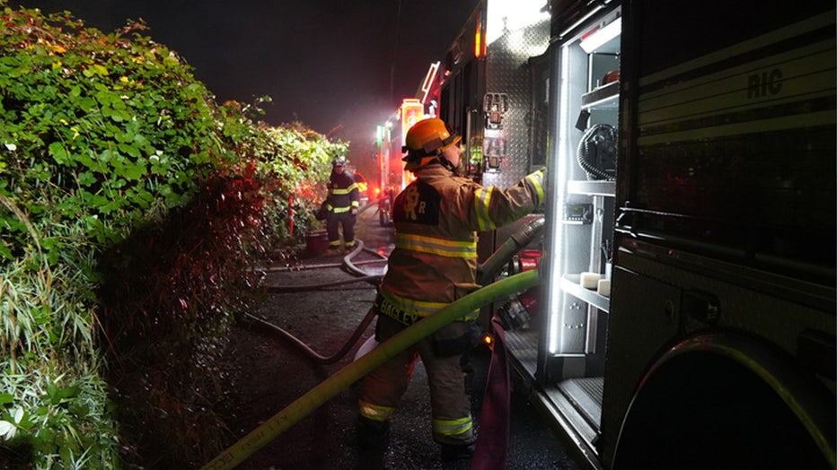 Firefighters rescued eight dogs, including six husky puppies, after an overnight fire displaced a family in Monroe early Tuesday morning.
According to Snohomish Regional Fire and Rescue (SRFR), crews responded to a structure fire near 208th Place Southeast and Old Monroe Duvall Highway at around 2 a.m.
Firefighters had to navigate a steep dirt road to find the home and discovered a 5th-wheel trailer and a nearby home were fully engulfed in flames. The residents had safely evacuated before firefighters arrived.
Since the area lacked nearby fire hydrants, Snohomish County Fire District 4 and Duvall Fire were called in to assist in maintaining the water supply.
SRFR said a primary search confirmed everyone made it out safely, but they also rescued six husky puppies and two adult huskies. 