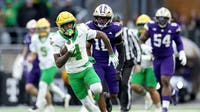 Malik Benson's 64-yard TD helps No. 5 Oregon pull away for 26-14 win over Washington