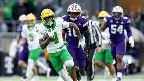 Malik Benson's 64-yard TD helps No. 5 Oregon pull away for 26-14 win over Washington