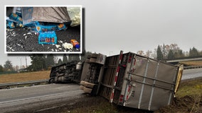 I-5 North WA traffic blocked by overturned semi-truck filled with juice