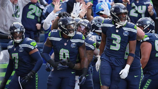 DeMarcus Lawrence returns two fumbles for TDs as Seattle Seahawks beat Cardinals 44-22