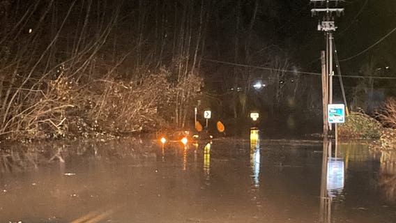 King County, WA road crew rescues driver trapped in floodwaters