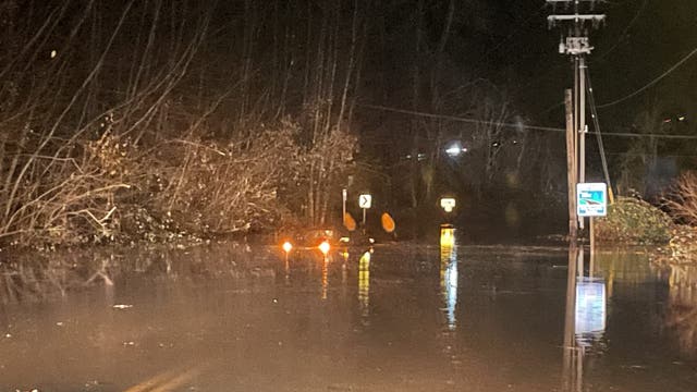 King County, WA road crew rescues driver trapped in floodwaters