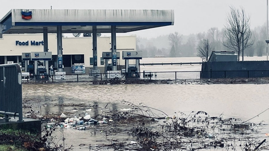 gas station flooded after heavy rain in Auburn, WA