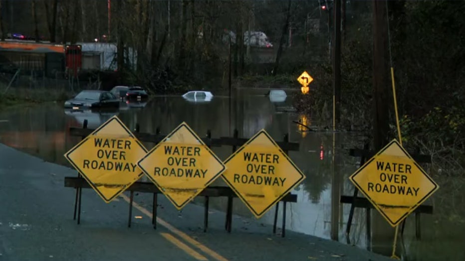 FOX 13 Seattle crews are in Sumner, where multiple vehicles appear to be almost completely submerged in floodwaters.