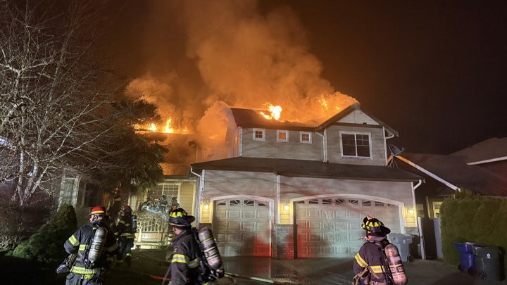Crews investigate house fire in Kent, WA