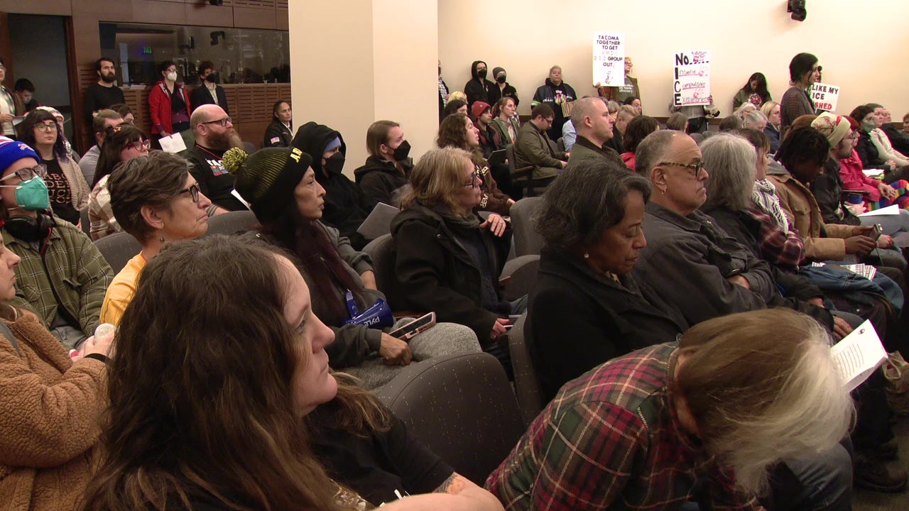 Dozens rally at Tacoma City Hall demanding ICE to leave