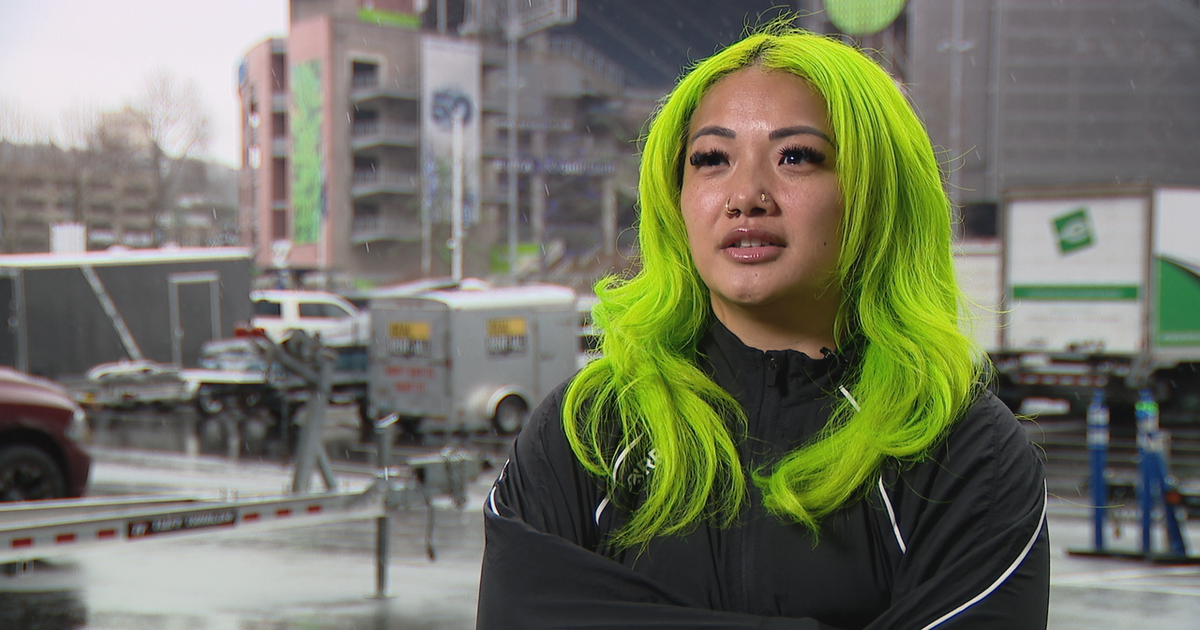 Who's the girl with the green hair at the Seahawks game?