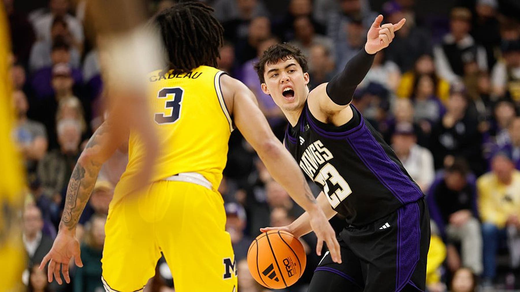 Washington falls 82-72 to No. 4 Michigan behind 20 points from Aday Mara